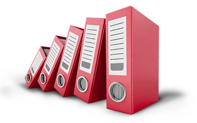 Czerwone segregatory ułożone w domino