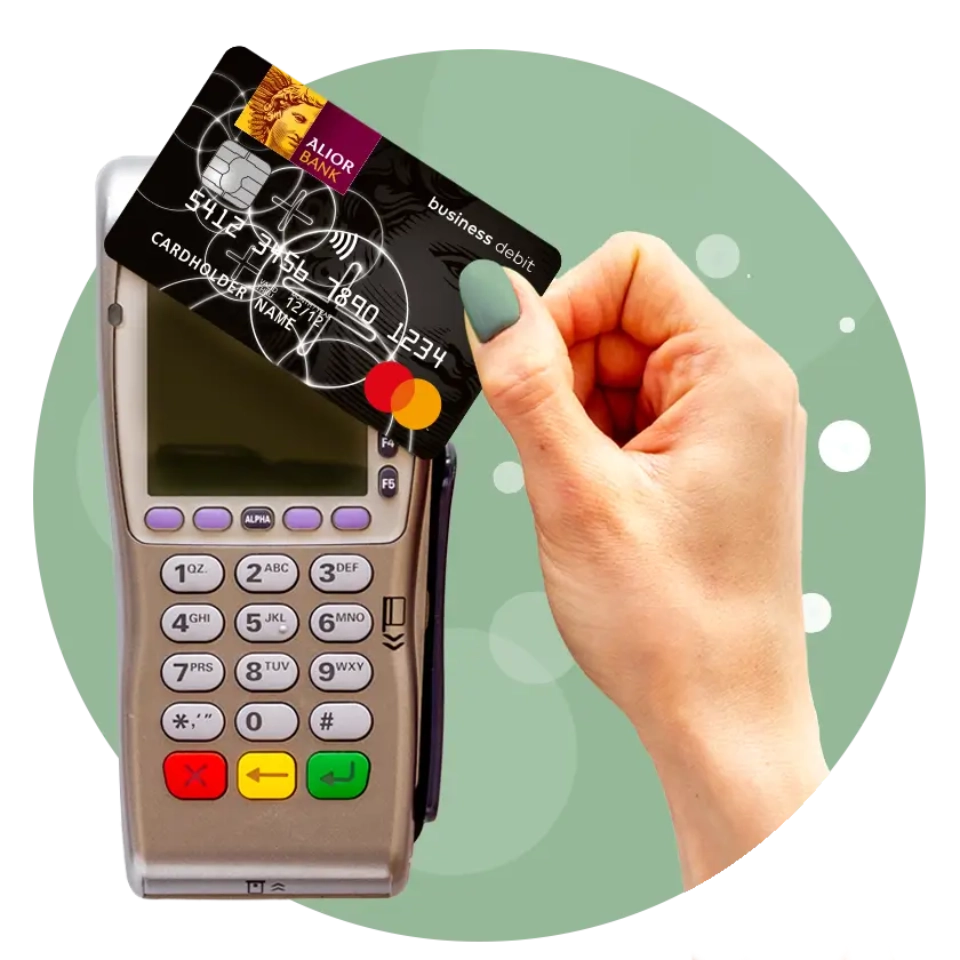 Terminal płatniczy i przykładana do niego karta płatnicza