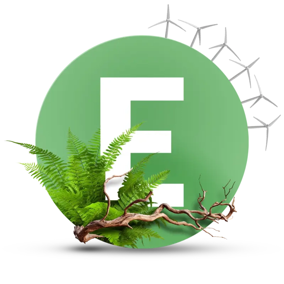 Litera E, dookoła zieleń oraz elektrownie wiatrowe. 
