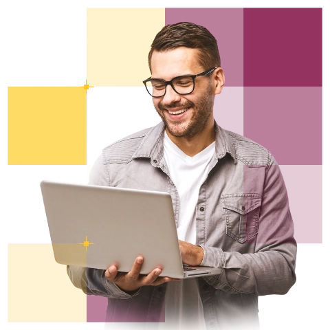 Mężczyzna korzystający z laptopa.