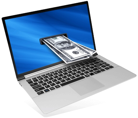 Laptop, z którego wystają banknoty
